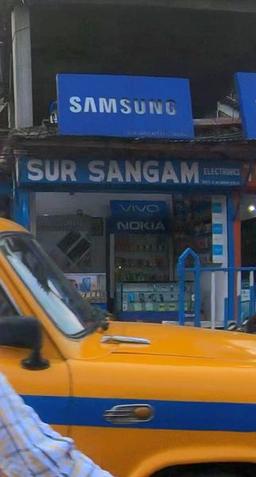 https://www.indiacom.com/photogallery/KAL21476_Sur Sangam Electronics_Mobile Phones - Sales & Services.jpg