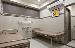 https://www.indiacom.com/photogallery/SOL1003995_Nirmal Anorectal And Multispeciality Hospital - Bedroom1.jpg