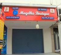 logo of Mugdha Boutique
