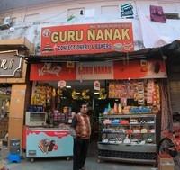 logo of Guru Nanak Confectionery And Bakery