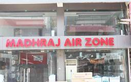 https://www.indiacom.com/photogallery/RJT1038006_Madhraj Air Zone Store Front.jpg