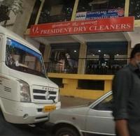 logo of President Dry Cleaners