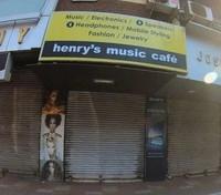 logo of Henry`s Music cafe