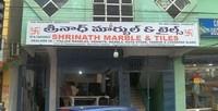 logo of Shrinath Marble & Tiles